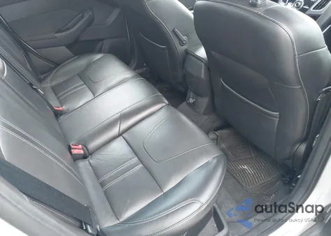 2012 Ford Focus Titanium z USA, uszkodzony, nr VIN 1FAHP3J28CL381248